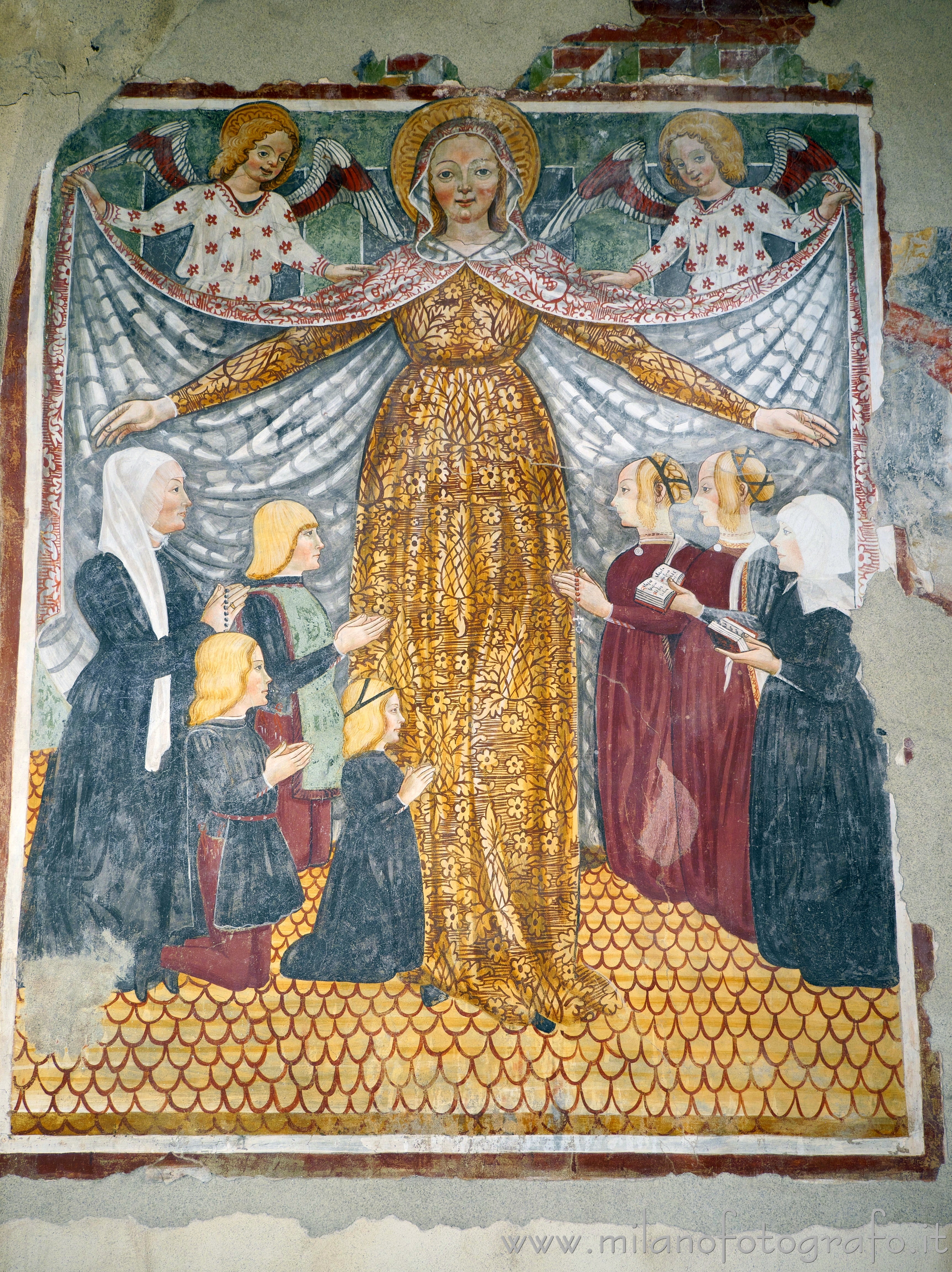 Casalvolone (Novara, Italy) - Madonna of Mercy and members of the Bulgaro family in the Church of St. Peter